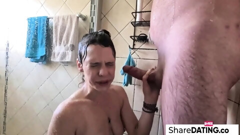 Skinny MILF giving me a blowjob in the shower , cum swallow