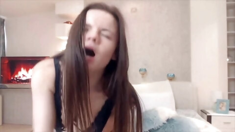 Petite brunette likes to masturbate on her live webcam
