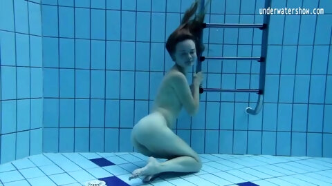 Petite small tits teen Clara underwater